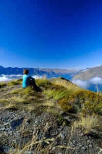 Reflecting on the moment on the Ben Lomond Hike in New Zealand